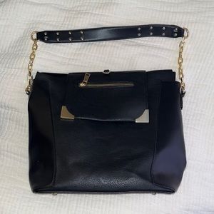 BLACK PURSE WITH GOLD ACCENTS